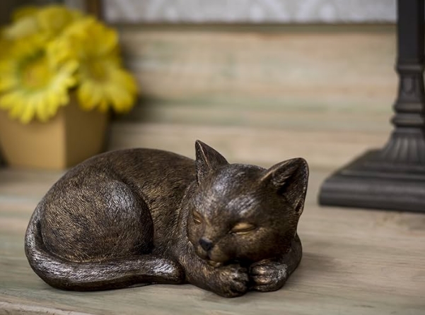  lying bronze cat statue